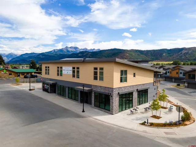 a view of a house with swimming pool