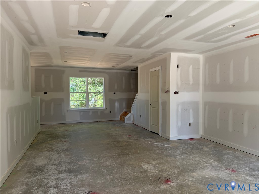 21305 Rutledge Avenue Petersburg, VA 23803 - Photo 14 of 14 a view of an empty room with a window