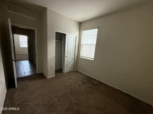 a bathroom with a sink vanity granite tub shower and a mirror