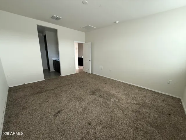 a bathroom with a sink double vanity and a mirror