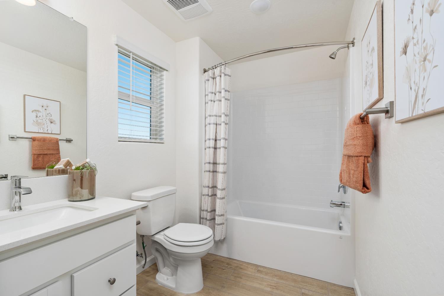 1532 Redbrick Lane Clovis, CA 93619 - Photo 23 of 33 a bathroom with a sink toilet and shower