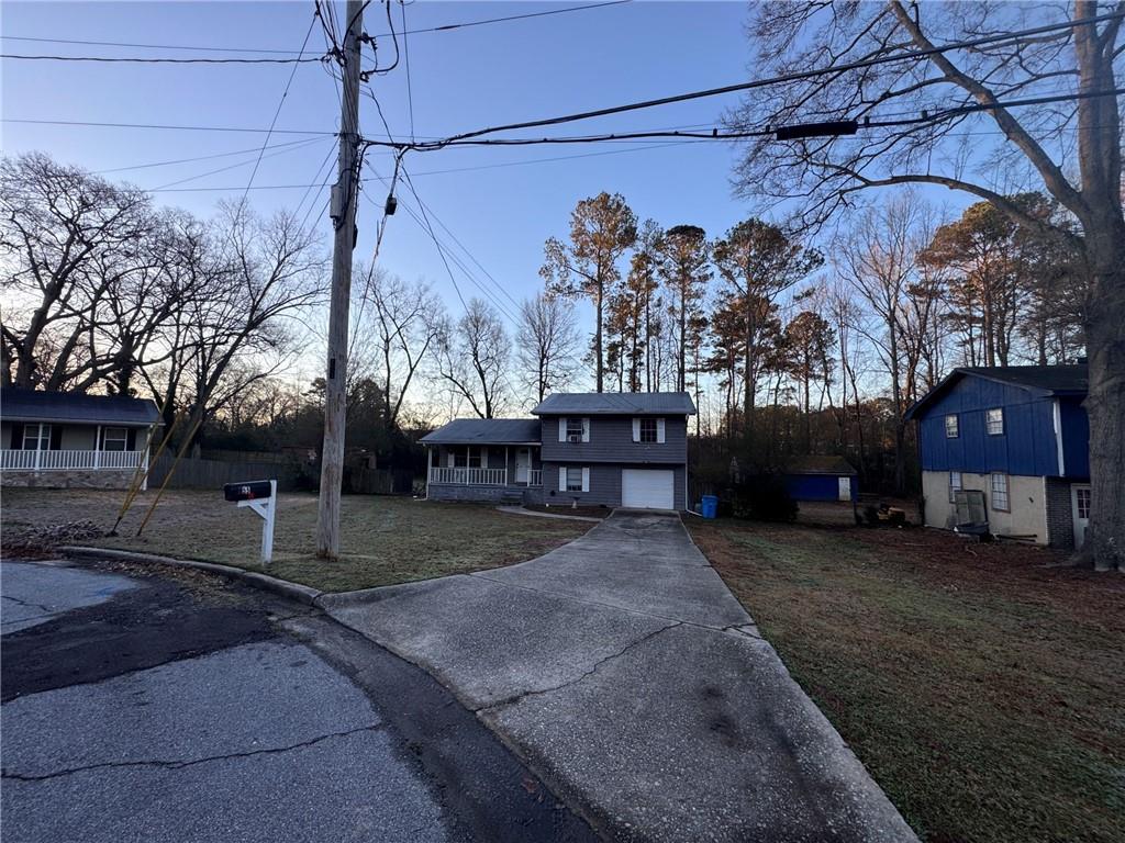 55 Porter Circle Hampton, GA 30228 - Photo 6 of 6 a view of a house with a yard and tree s