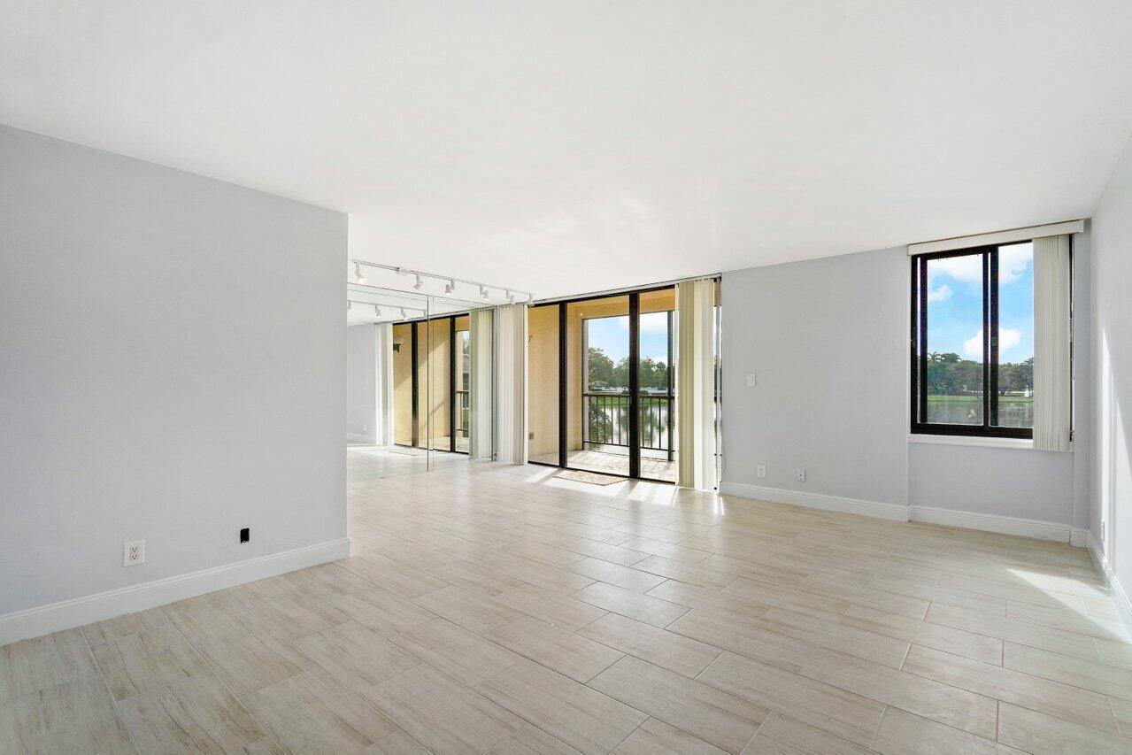 3304 Bridgewood Drive Boca Raton, FL 33434 - Photo 7 of 44 family room/dining 2