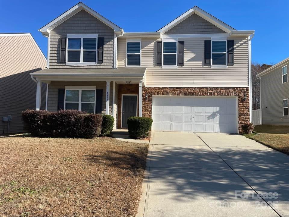 8715 Balsam Bay Road Charlotte, NC 28227 - Photo 1 of 15 a front view of a house with yard