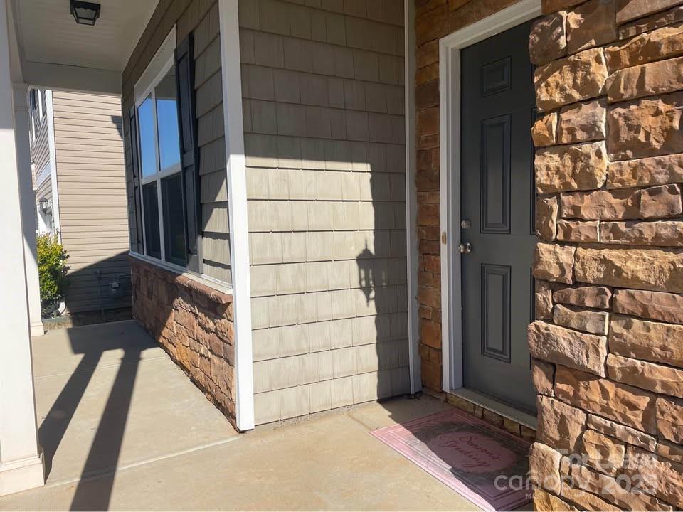 8715 Balsam Bay Road Charlotte, NC 28227 - Photo 2 of 15 a view of front door and wooden floor