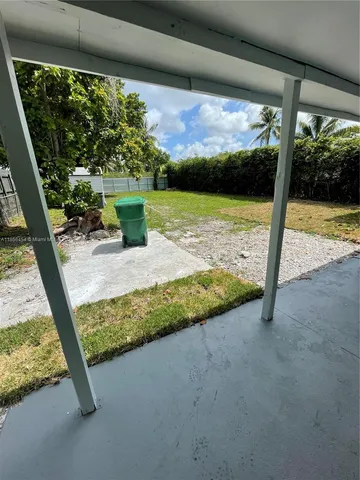 a view of swimming pool from a balcony