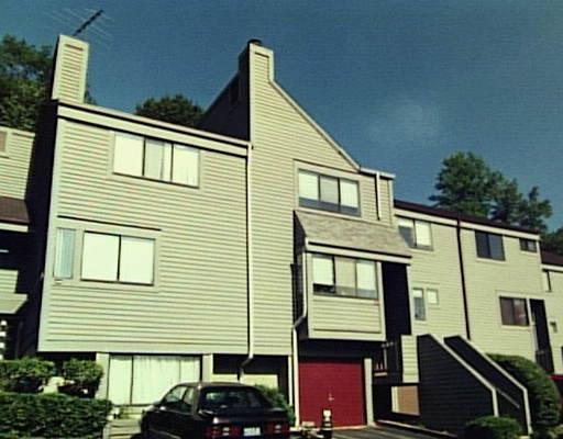 237 Sunrise Hill Road, Unit 237 Norwalk, CT 06851 - Photo 1 of 1 a front view of a house
