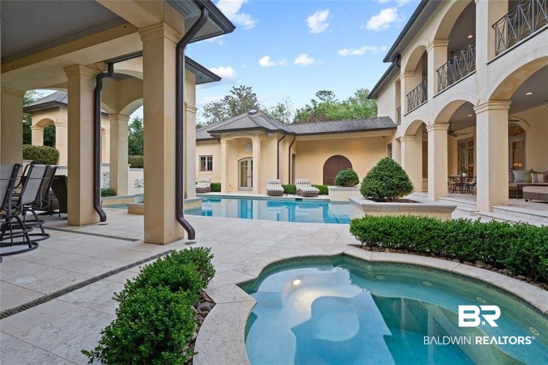 4 Chancery Court Mobile, AL 36608 - Photo 2 of 54 View of pool featuring ceiling fan and a patio area