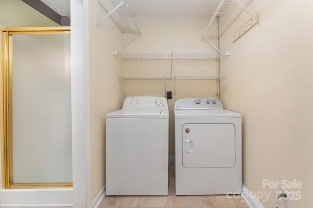 a utility room with dryer and washer