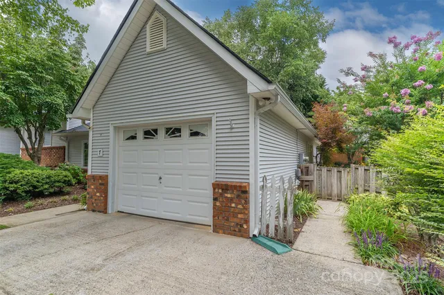 a view of a house with a garage