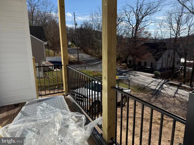 a view of a porch with a tree