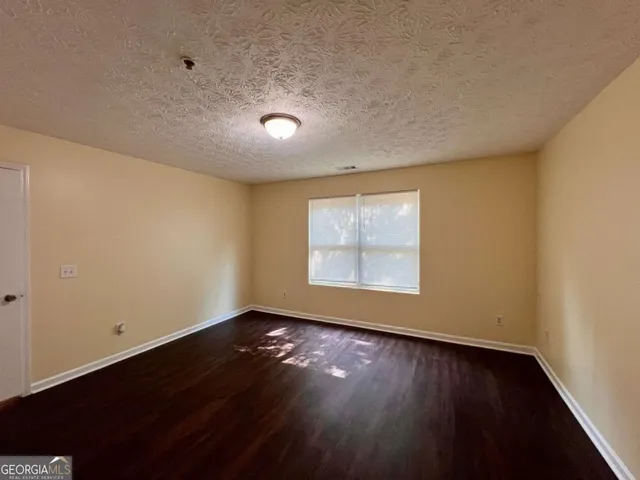 a bathroom with a sink a toilet and bathtub