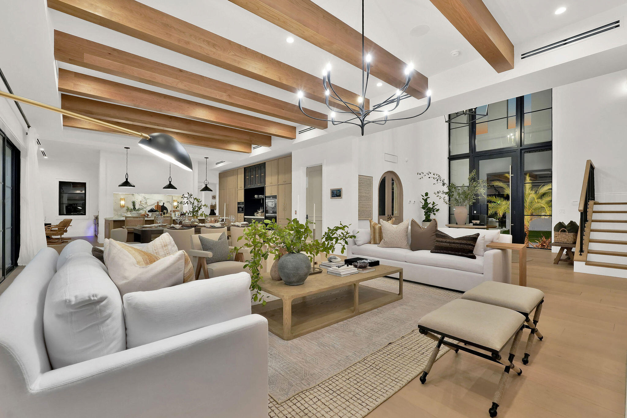 839 Chestnut Court Marco Island, FL 34145 - Photo 36 of 88 a living room with furniture and a chandelier