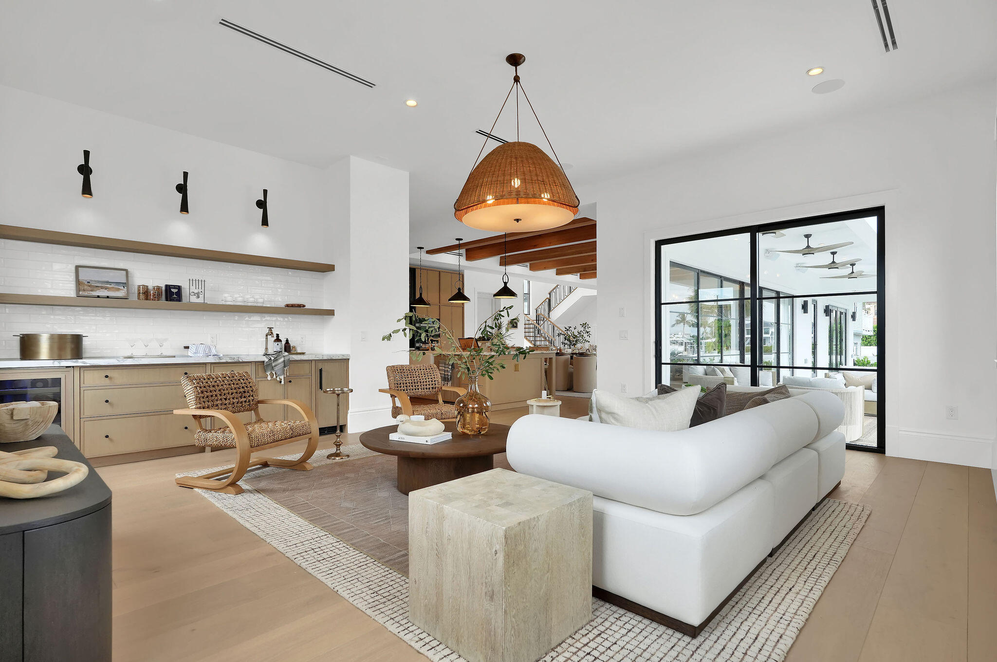839 Chestnut Court Marco Island, FL 34145 - Photo 49 of 88 a living room with furniture and a large window
