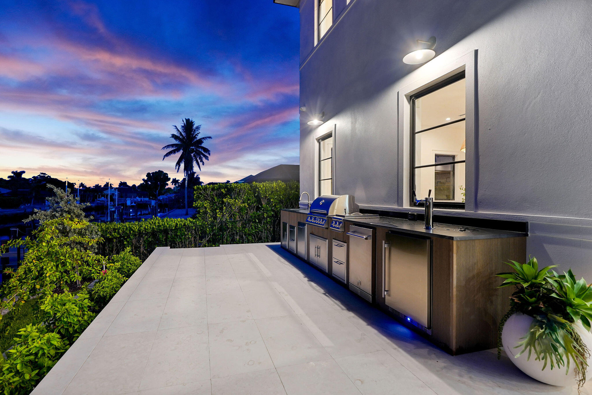 839 Chestnut Court Marco Island, FL 34145 - Photo 66 of 88 Twilight view of summer kitchen