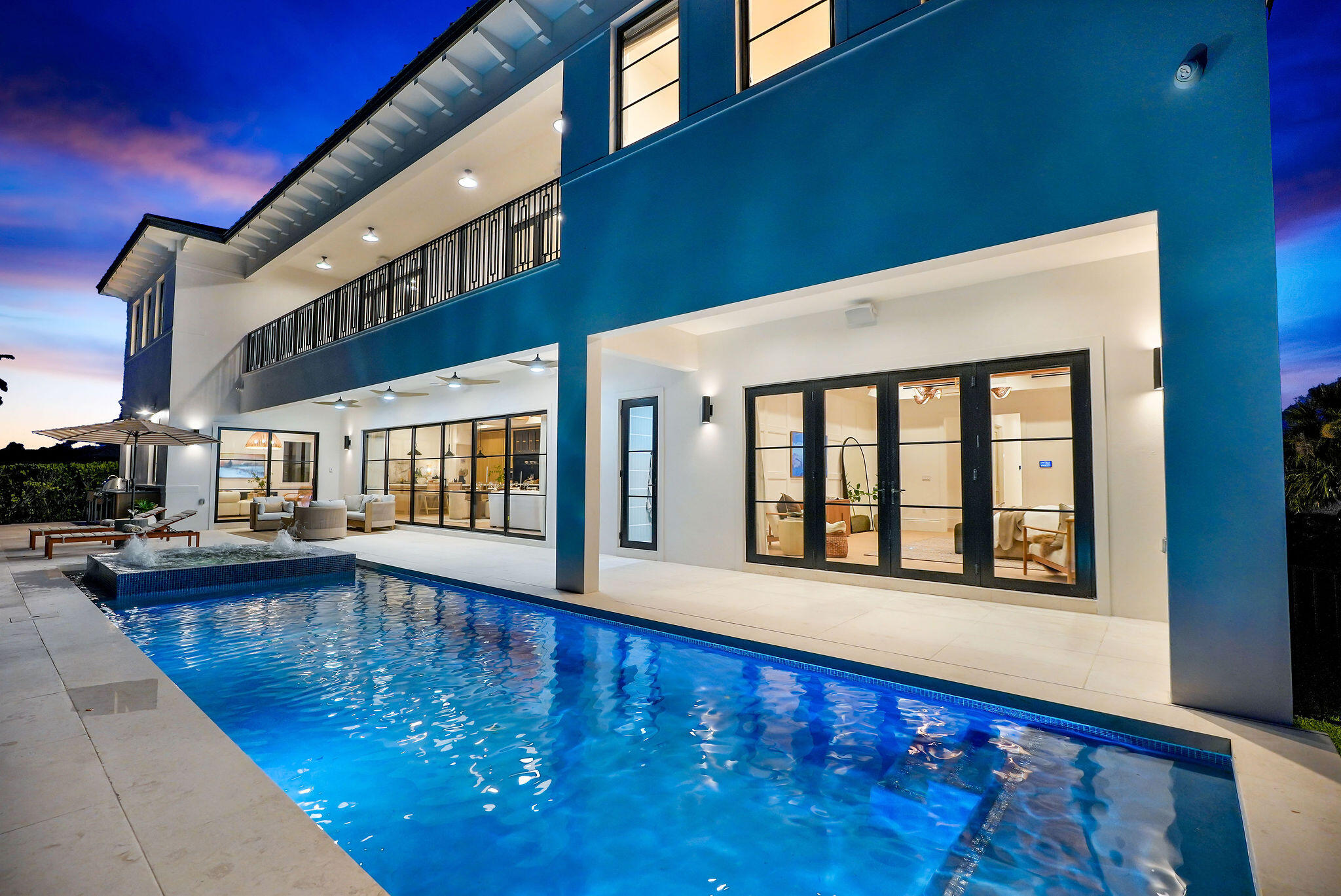 839 Chestnut Court Marco Island, FL 34145 - Photo 68 of 88 Night poolside view toward house