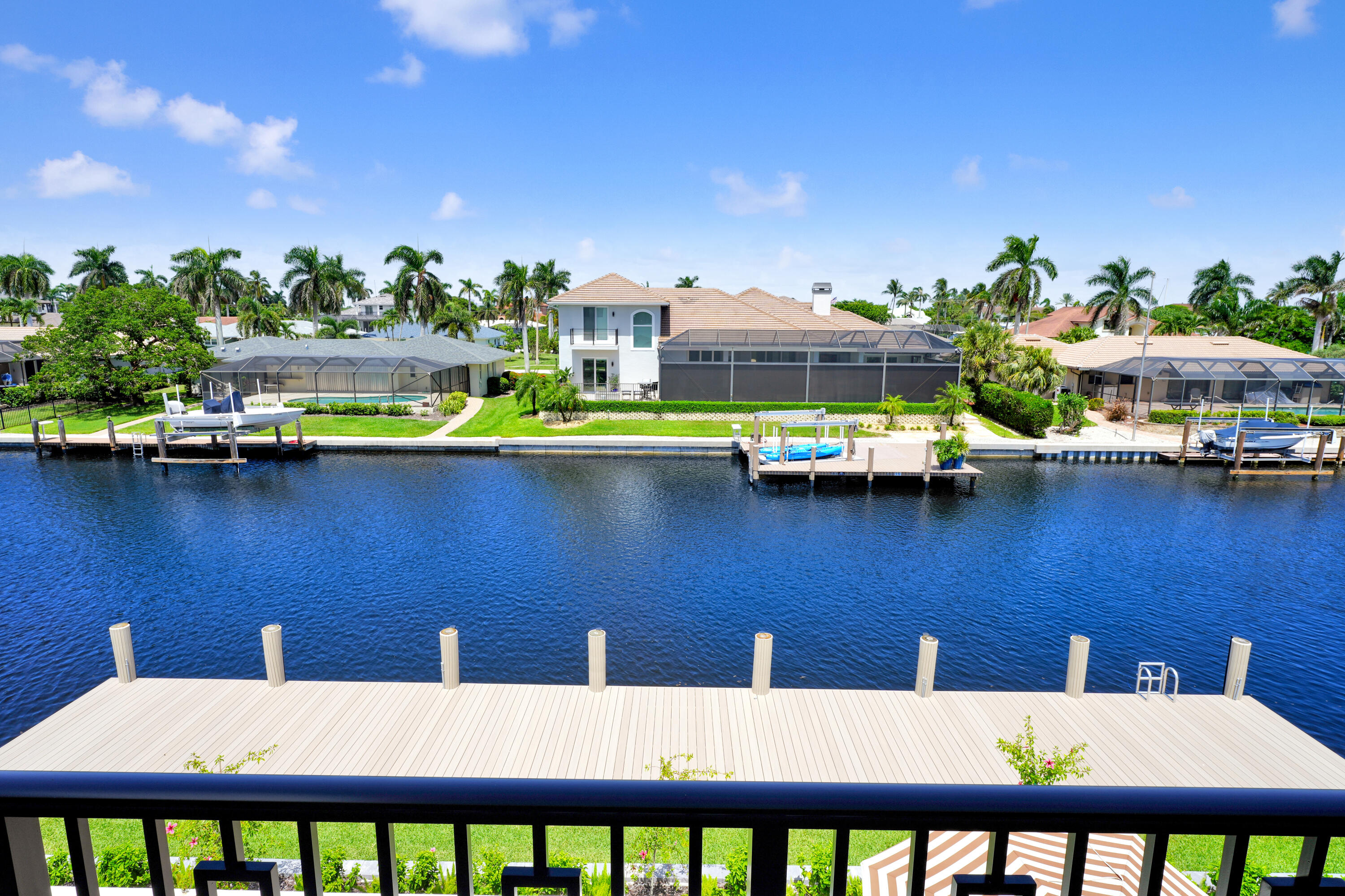 839 Chestnut Court Marco Island, FL 34145 - Photo 88 of 88 a balcony with table and chairs