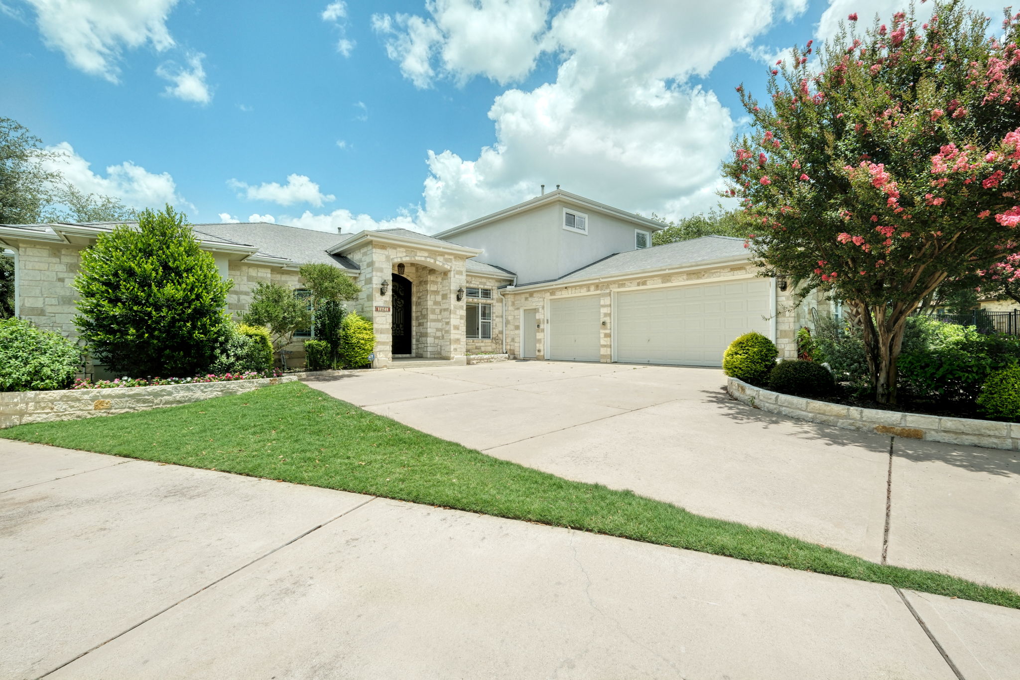 1601 Coronado Leander, TX 78641 - Photo 5 of 37 a front view of a house with a yard and garage