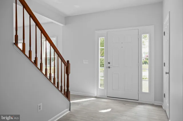 a view of an entryway with staircase