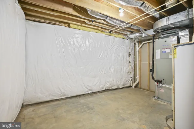 a view of a room with wooden walls