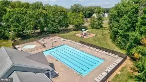 a view of a yard with an outdoor space
