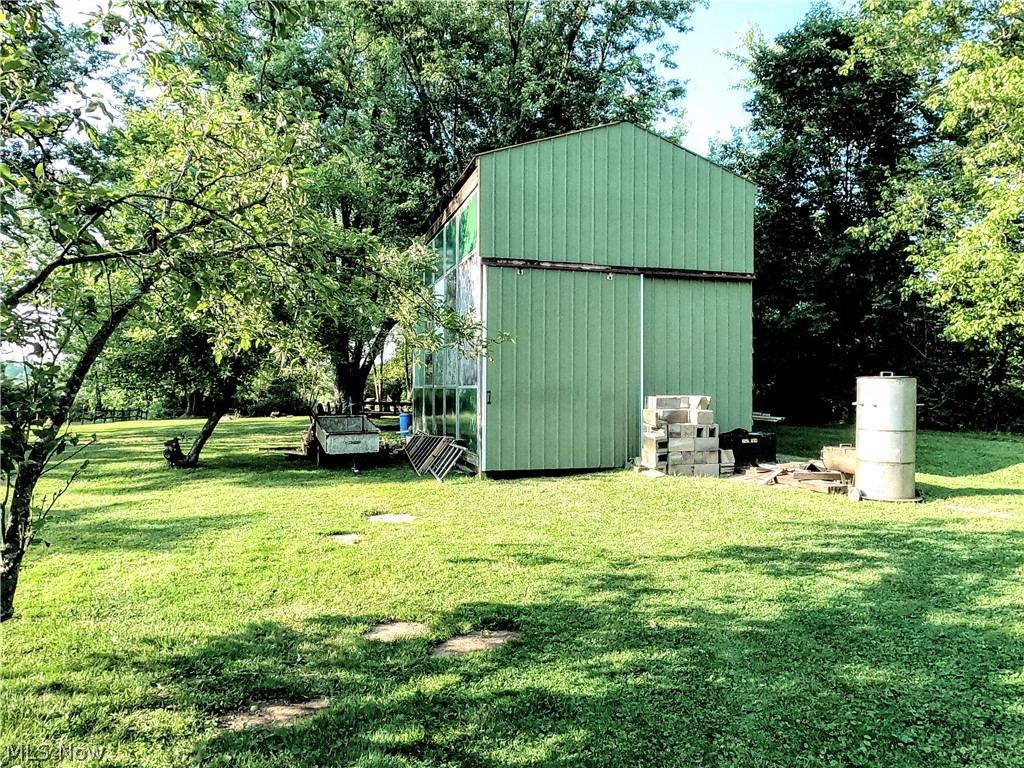 1425 Eastern Road Rittman, OH 44270 - Photo 23 of 28 View of shed / structure featuring a yard