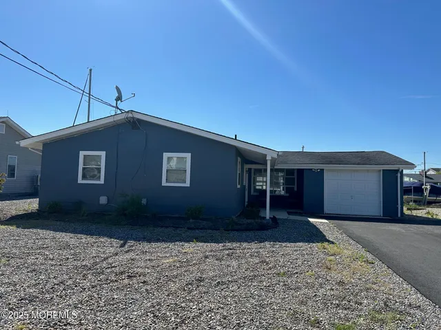 a house view with a backyard space