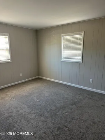 an empty room with a workbench