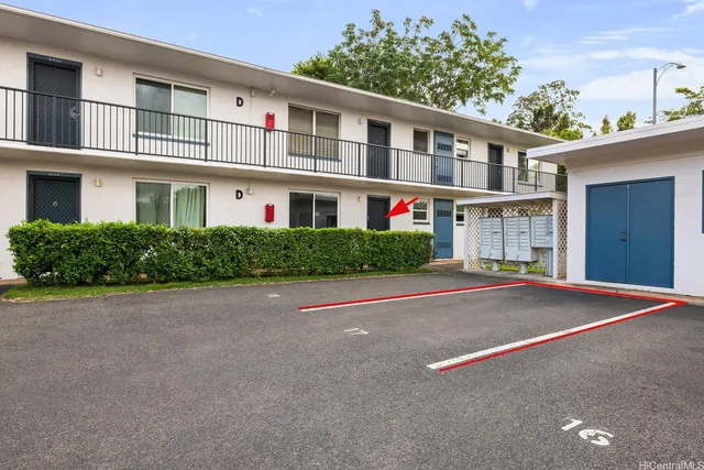 a view of a swimming pool with lounge chairs