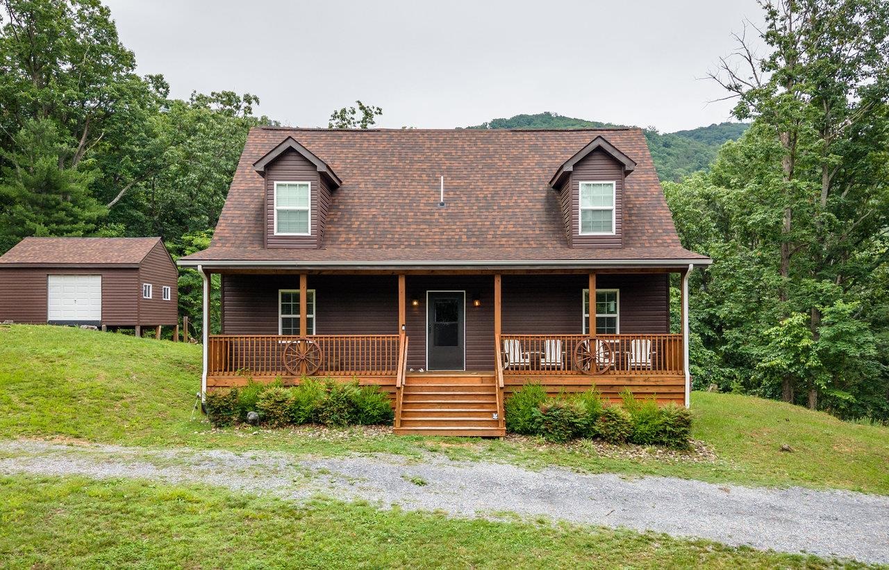159 Park View Shenandoah, VA 22849 - Photo 1 of 70 a front view of a house with garden