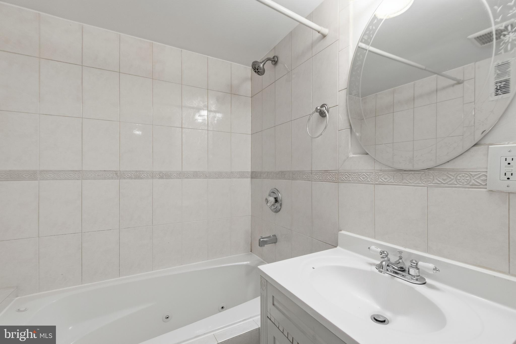440 Delafield Place Northwest Washington, DC 20011 - Photo 28 of 33 a bathroom with a sink and shower