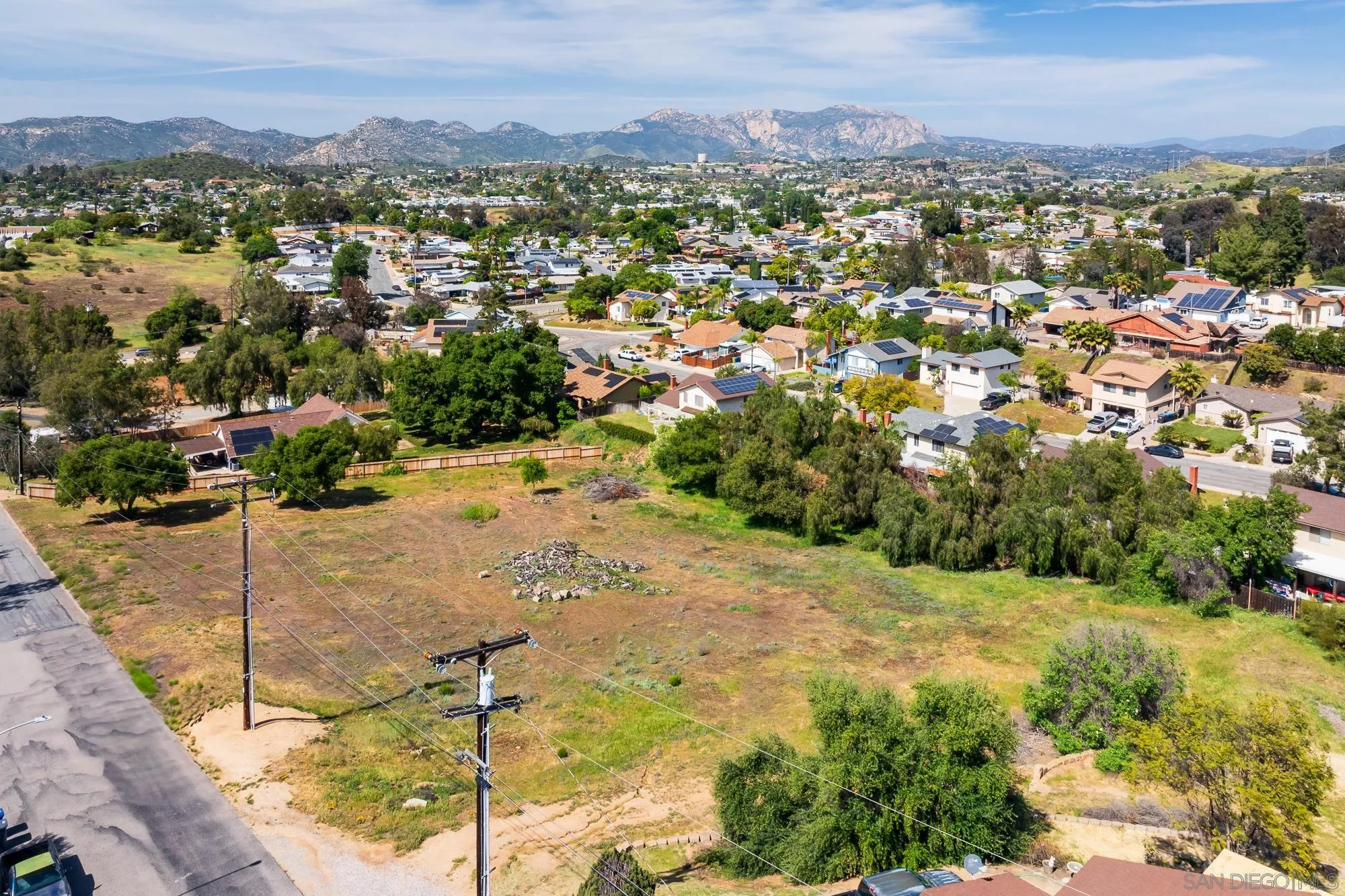0 C. De Buena Fe, Unit 75 El Cajon, CA 92021 - Photo 3 of 11 a view of a city with mountains in the background