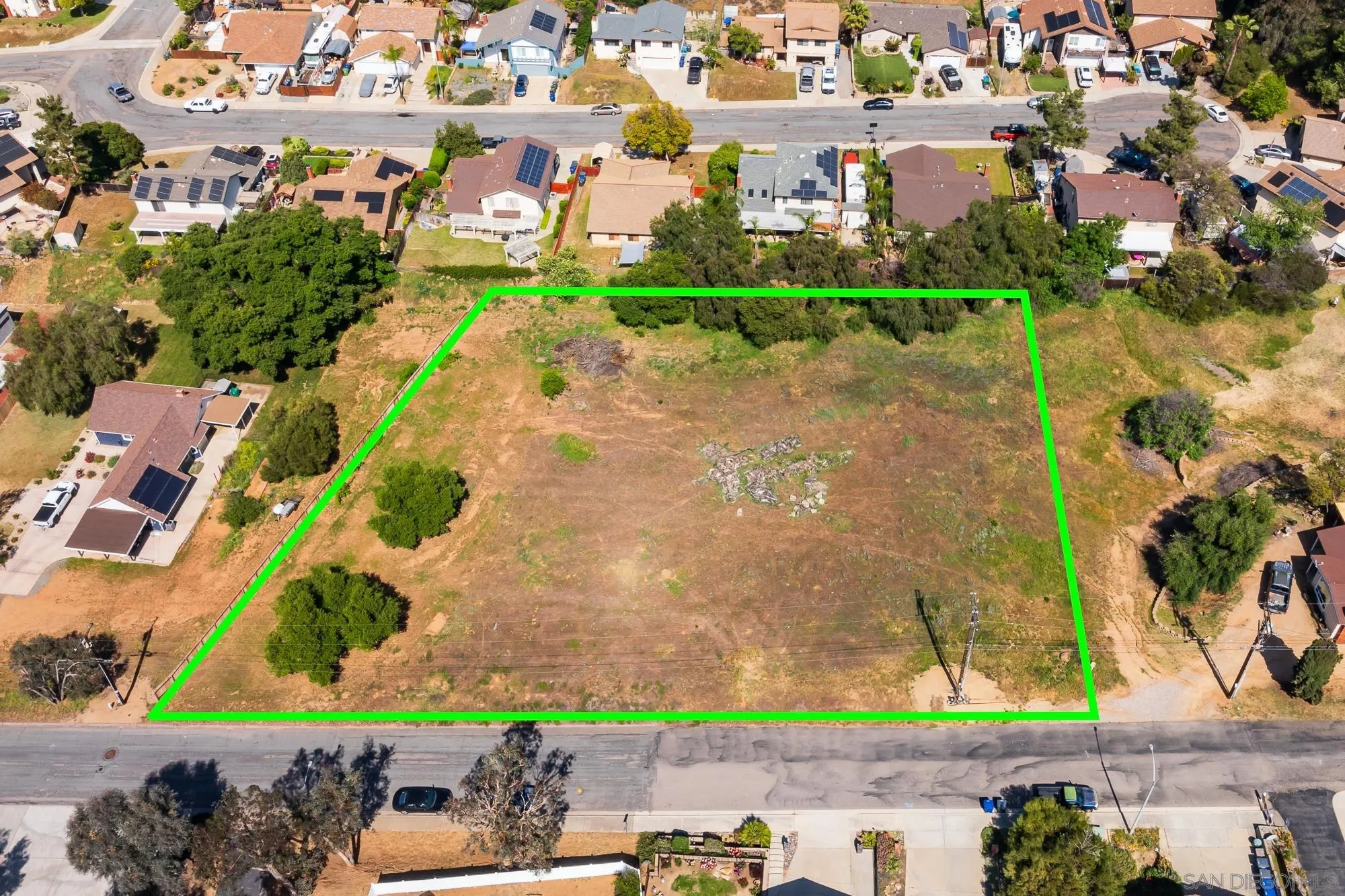 0 C. De Buena Fe, Unit 75 El Cajon, CA 92021 - Photo 4 of 11 an aerial view of residential houses with outdoor space