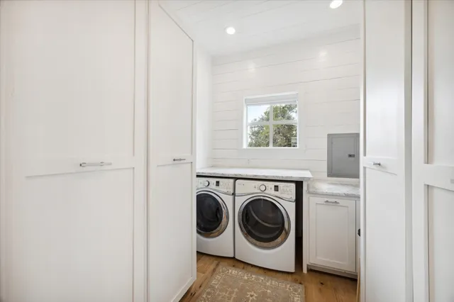 a utility room with dryer and washer