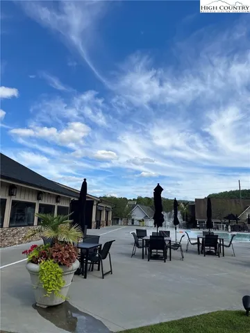 a view of a terrace with sitting area
