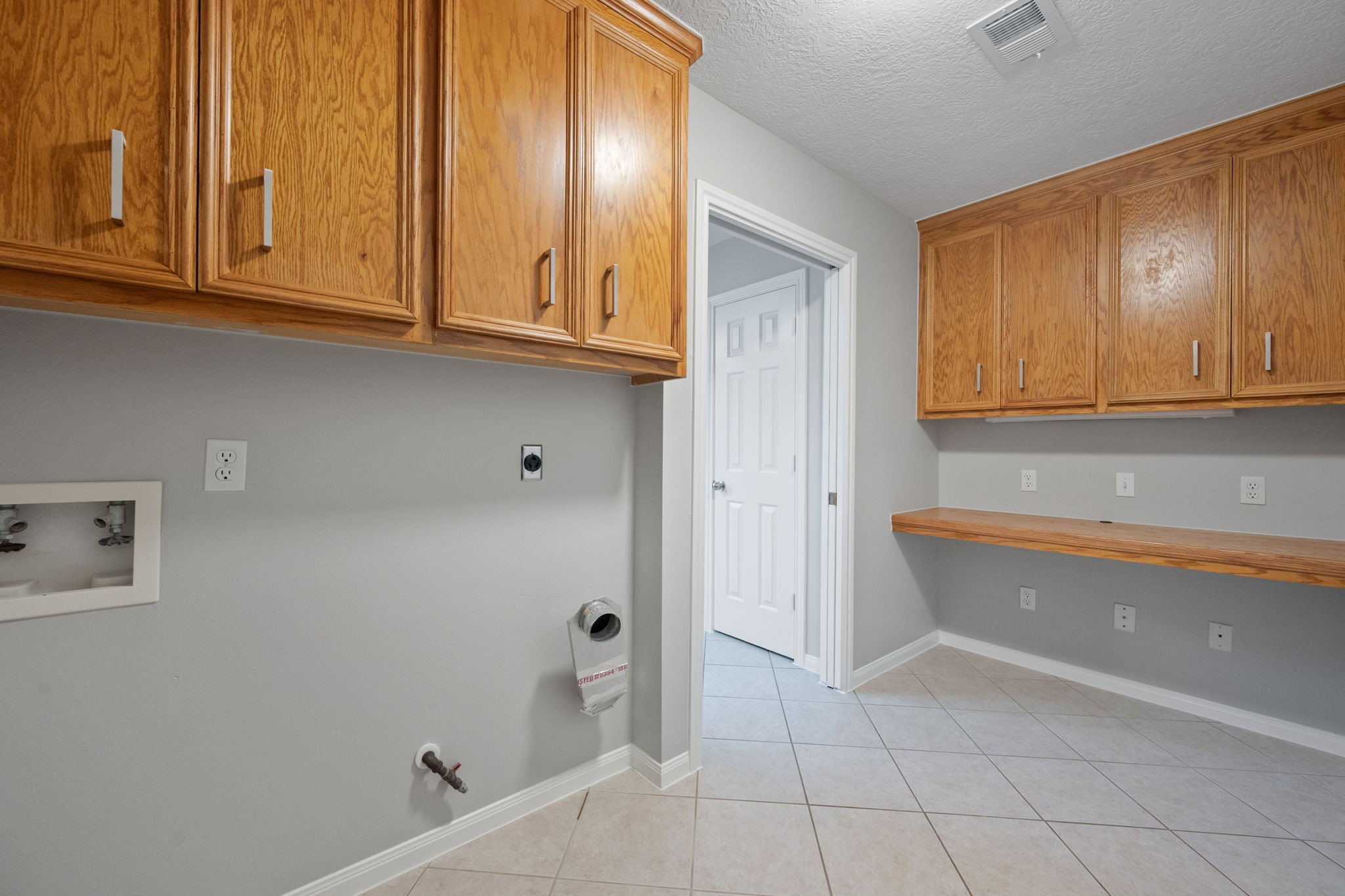 460 West Houston Street Highlands, TX 77562 - Photo 9 of 14 a bathroom with a tub and shower