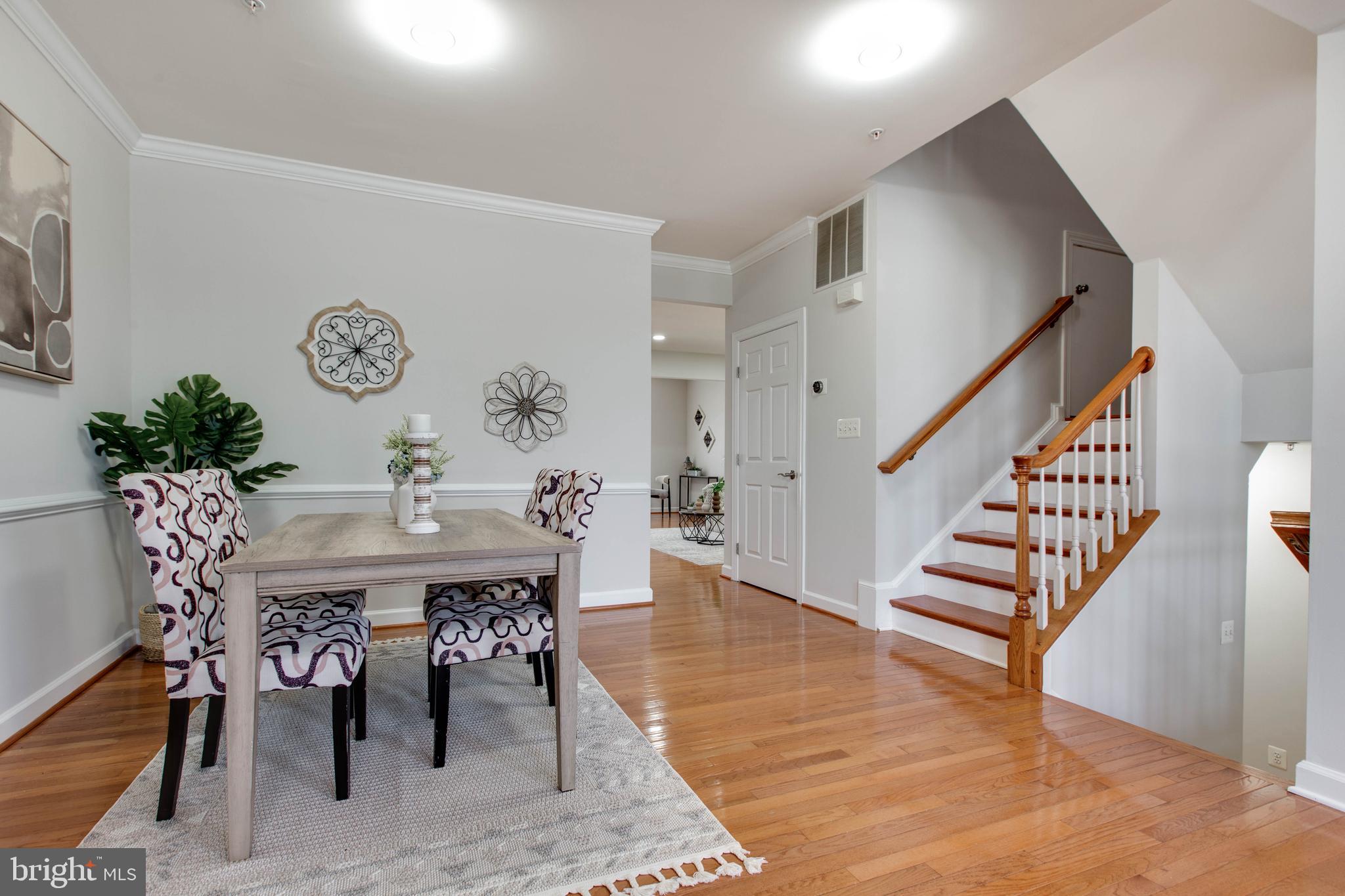 1506 Penzance Way Hanover, MD 21076 - Photo 13 of 53 a view of a dining room with furniture