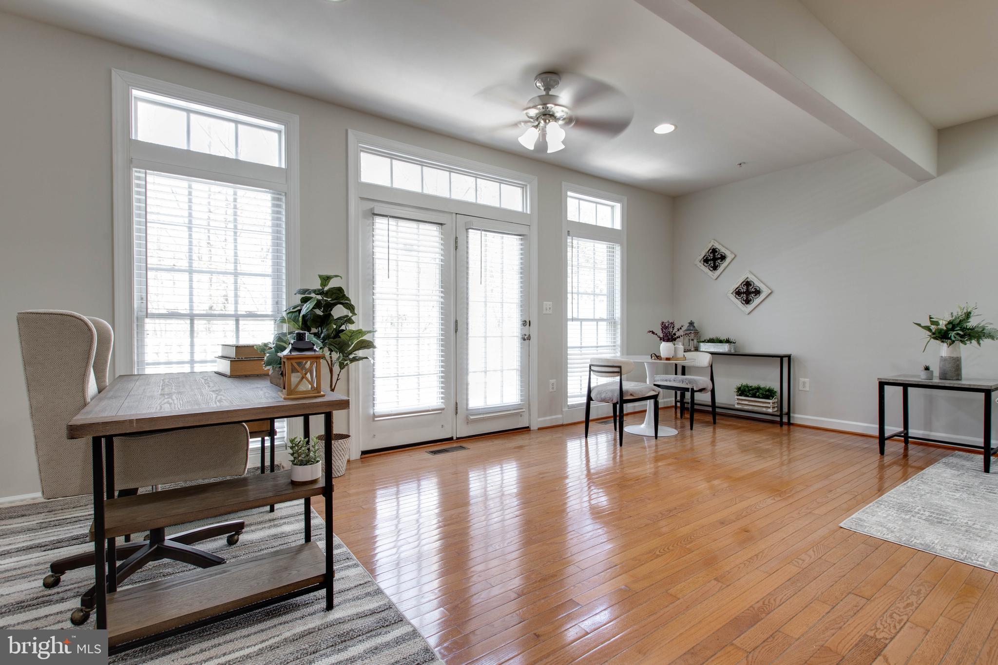 1506 Penzance Way Hanover, MD 21076 - Photo 18 of 53 a view of a livingroom with furniture window and wooden floor