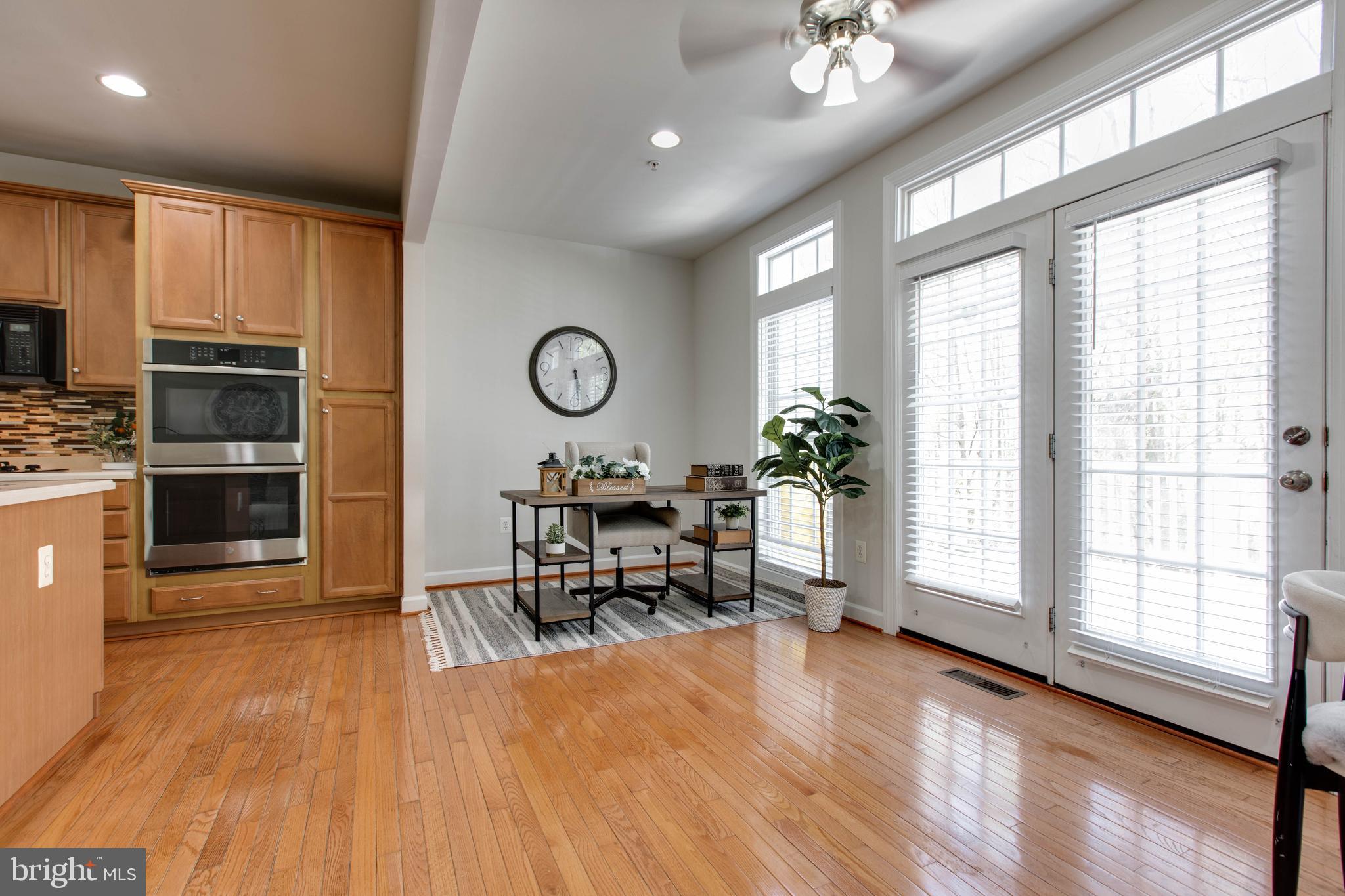 1506 Penzance Way Hanover, MD 21076 - Photo 19 of 53 a living room with furniture and a large window