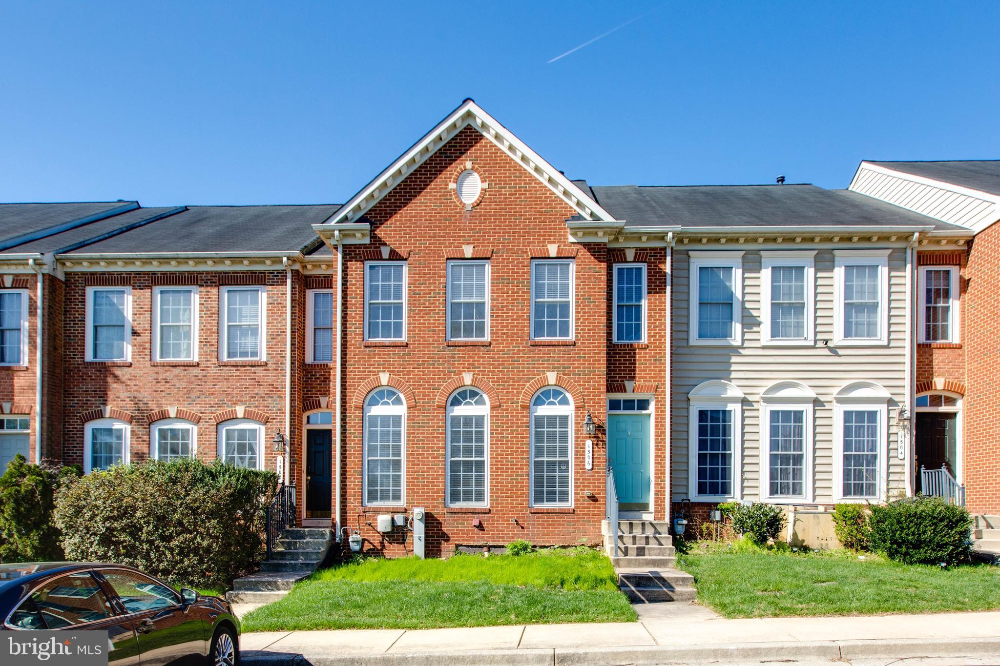 1506 Penzance Way Hanover, MD 21076 - Photo 2 of 53 a front view of a house with a yard