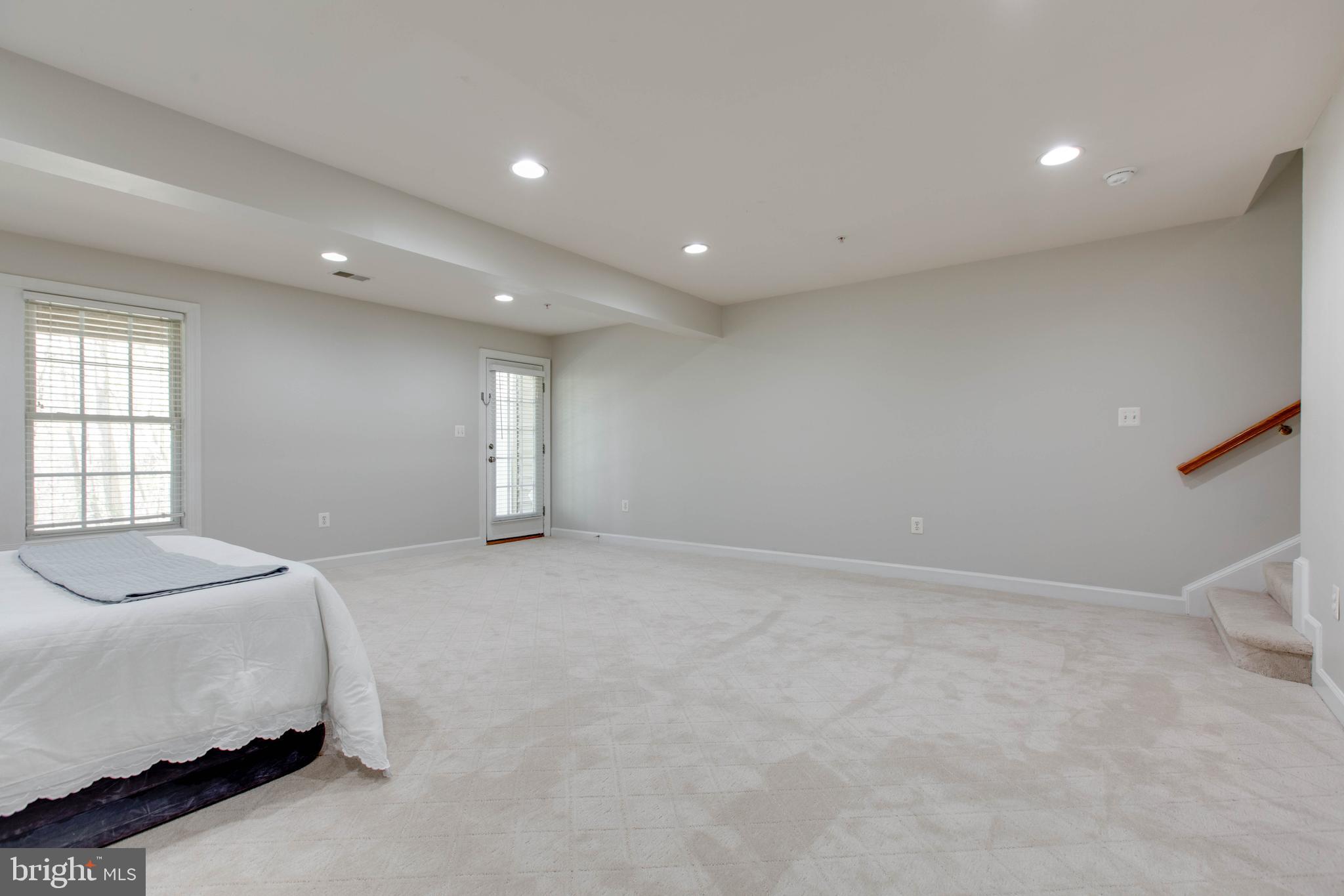 1506 Penzance Way Hanover, MD 21076 - Photo 46 of 53 a spacious bedroom with a bed and a window