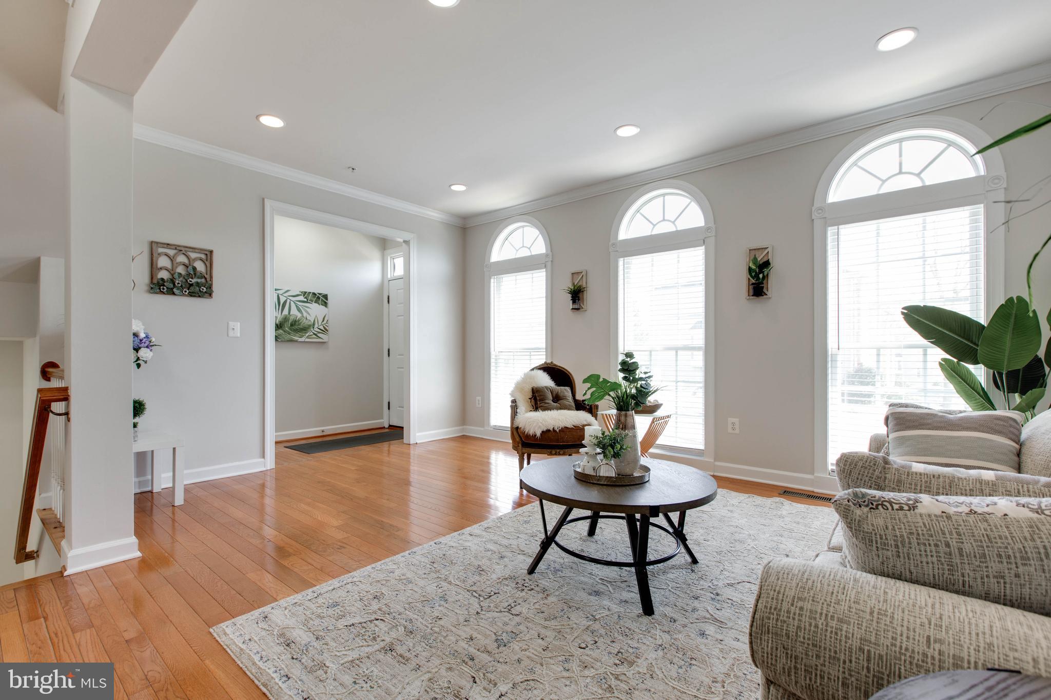 1506 Penzance Way Hanover, MD 21076 - Photo 10 of 53 a living room with furniture and a large window