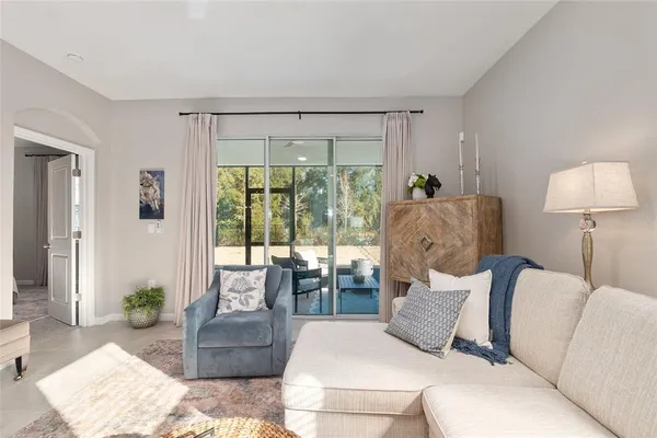 a kitchen with granite countertop a sink stove and refrigerator