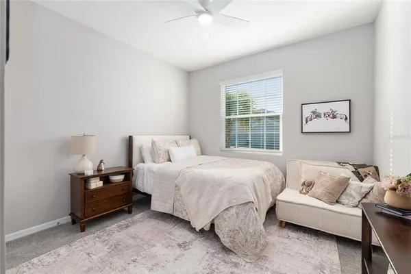 a view of a swimming pool and a yard