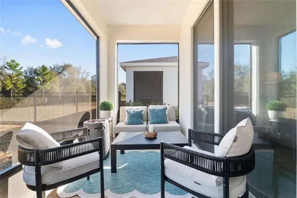 a view of a lake with a house in the background