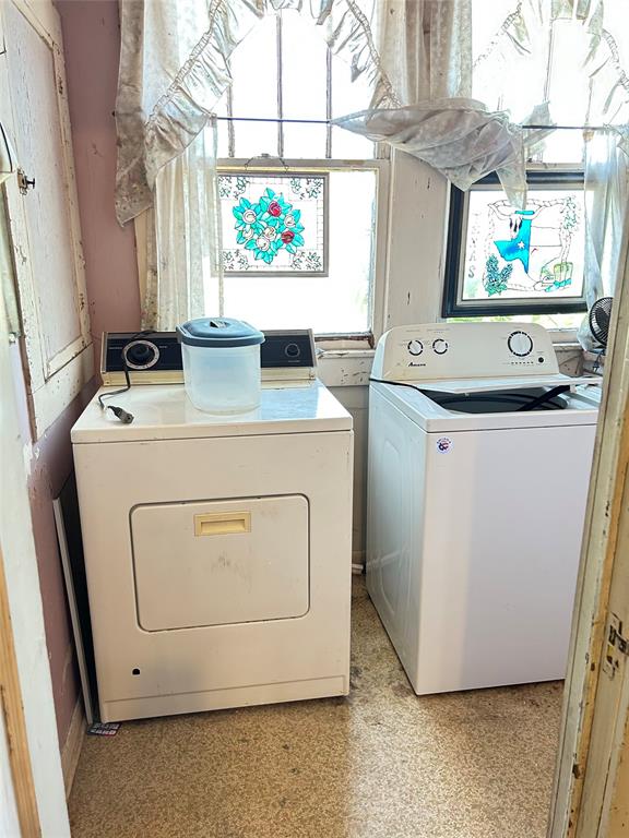 360 North Grafton Street Dublin, TX 76446 - Photo 21 of 24 A lovely laundry room with windows for plenty of natural light.