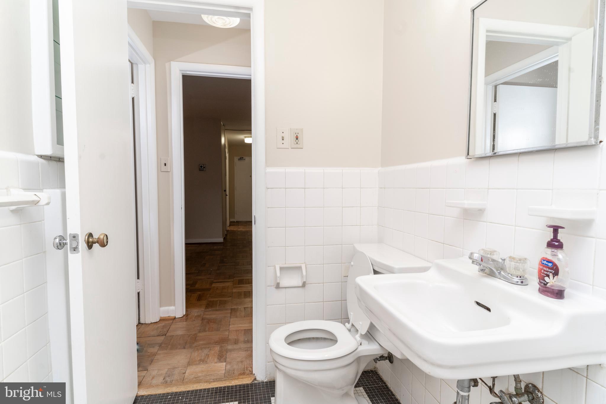 10500 Montrose Avenue, Unit M4 Rockville, MD 20852 - Photo 13 of 17 a bathroom with a sink and a toilet