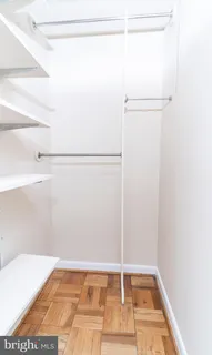 a view of a room with racks on the wall