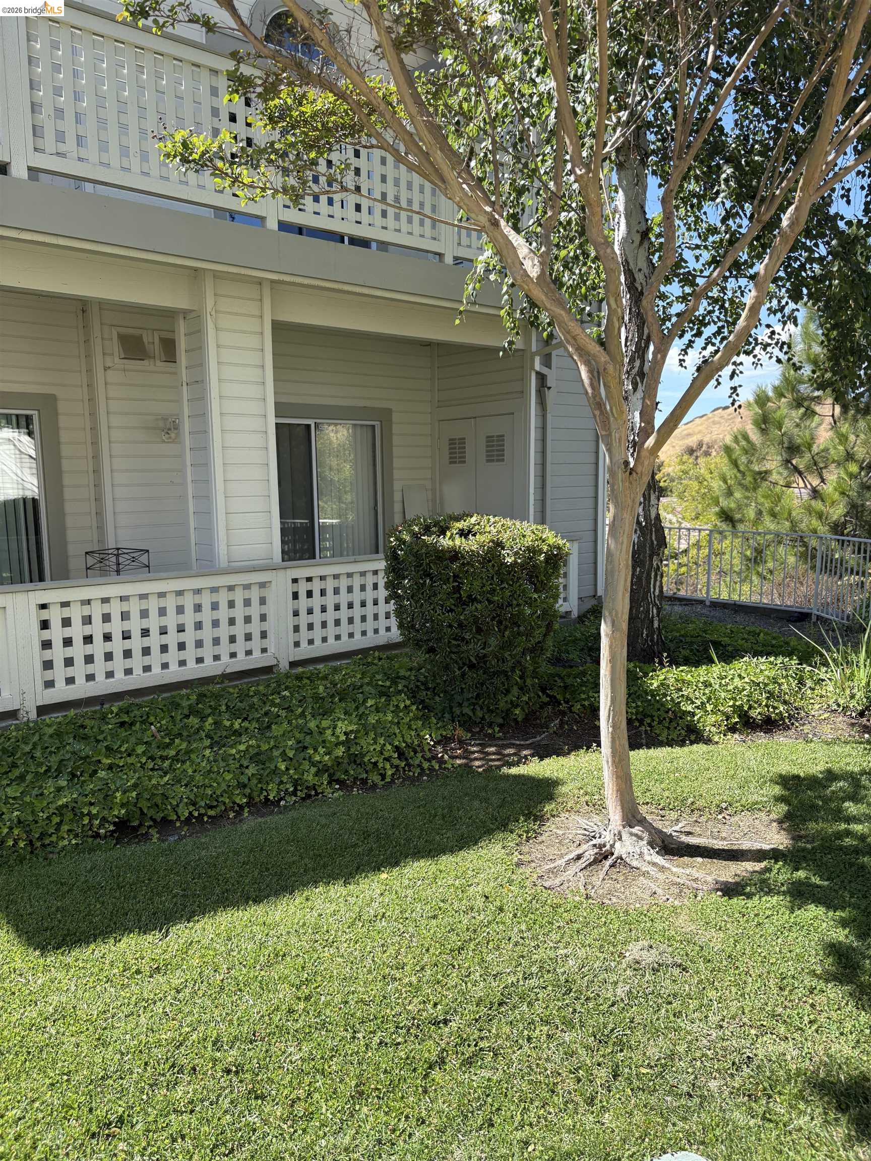 256 Napoli Court Hercules, CA 94547 - Photo 3 of 14 a view of a house with a yard
