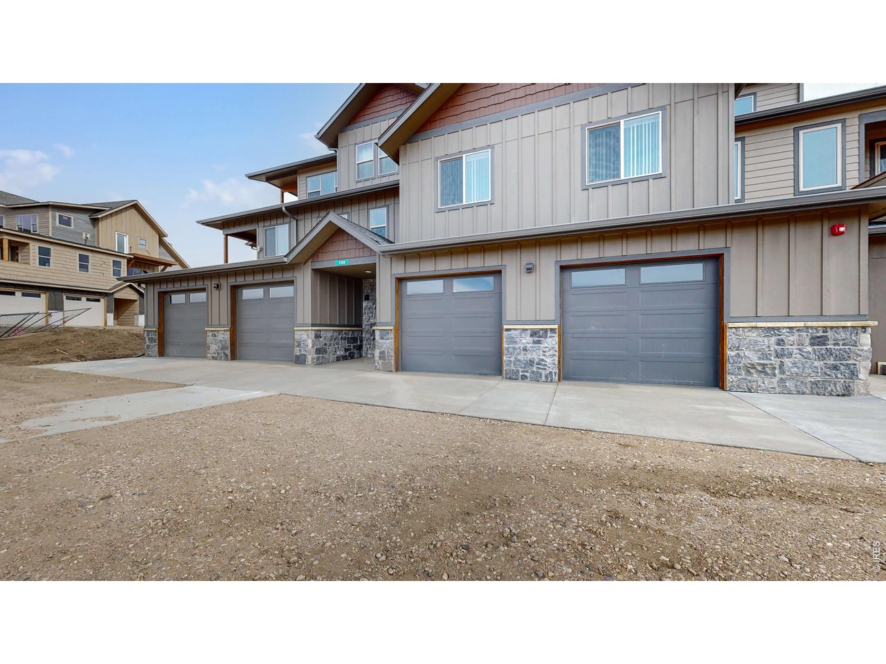 1734 Wildfire Road, Unit 204 Estes Park, CO 80517 - Photo 25 of 31 a black and white photo of a house